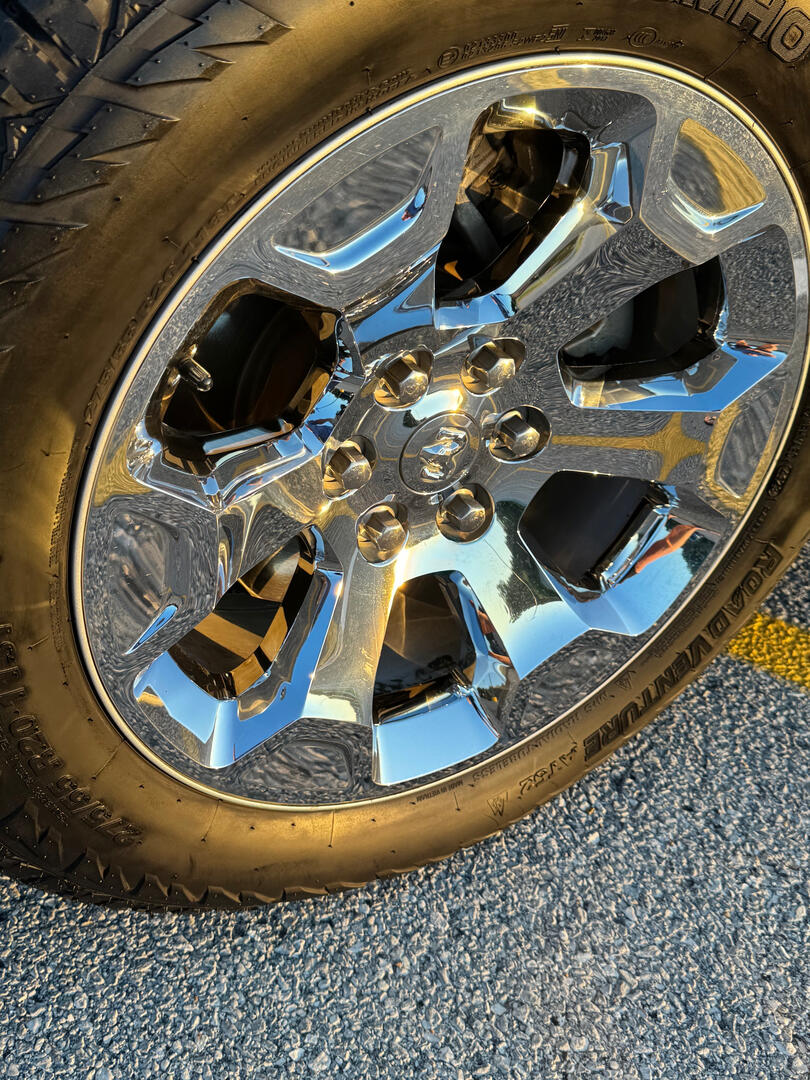 Clean chrome Ram wheel and dressed tire after detailing
